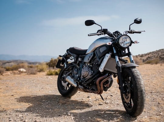 motorcycle on highway waiting to be shipped